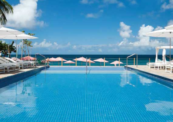 Front and back covers and spreads of a promotional brochure for Bodyholiday St. Lucia.